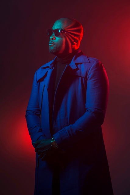 Keith portrait in red and blue studio lighting