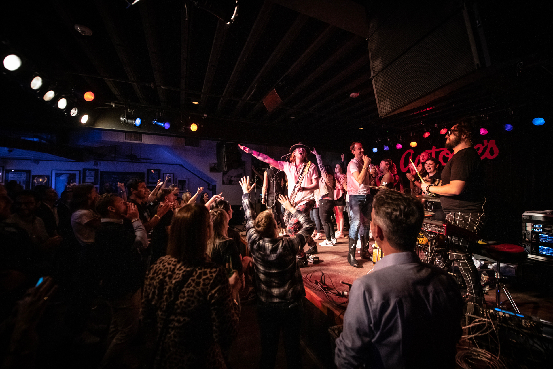 Band on stage with the crowd cheering