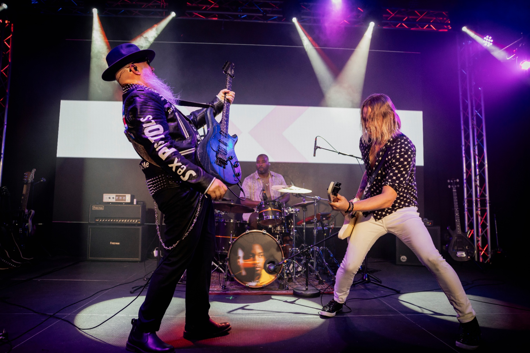 Full band performance under stage lights